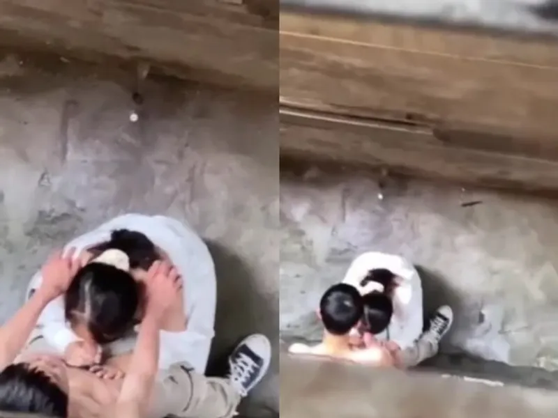 Quay lén nữ sinh bú cậu bé người yêu ở khe nhà